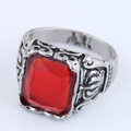 Macro shot of square red stone and vintage silver carved pattern on gothic claw ring - Square Red Gemstone (019022021)