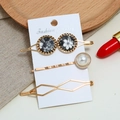 Three-piece gold hair clip set with floral patterns and pearls on jewelry card - Black (0190508104)