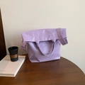 Light purple faux leather tote bag with wide shoulder strap and cylindrical handle - Purple