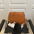 French retro caramel crossbody bag with wavy flap design and gold chain strap - Brown