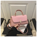 Borsa a mano rosa minimalista in pelle PU con chiusura a scatto girevole dorata - Rosa