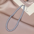 Elegant silver grey pearl necklace with lobster clasp on luxury champagne silk fabric - 8mm / Gray