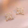 Elegant gold four-pointed star earrings with zircon inlay on luxury champagne silk - Four-pointed Star Cluster Studs(E0919)