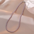 Lavender pearl necklace with silver lobster clasp on champagne satin background - 4mm / Purple