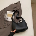 Matte black leather crescent hobo bag with gold buckle and stylish wide shoulder strap - Black