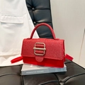 Elegant red square handbag in sparkling glitter and smooth leather finish - Red