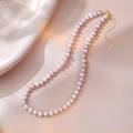 Detail of S925 silver lobster clasp and pink freshwater pearls on a silk background - Light Purple Pink Style (YX0071) / Approx. 6.0mm Pearl
