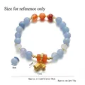 Blue chalcedony bead bracelet with lily of the valley bells and orange agate accents - Lily of the Valley Agate Beaded Style (TS0503)