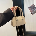 Elegant beige shell-shaped handbag with litchi texture and gold chain strap - Khaki