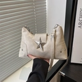 Cream textured leather shoulder bag with large silver star buckle and small star studs - Beige