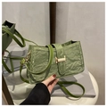 Detail of green pleated crossbody bag with a vintage gold metal clasp and leather strap - Green