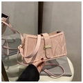 Close-up of pink marbled shoulder bag with gold metal buckle and thin leather strap - Pink