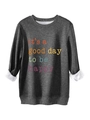 Detail of dark grey sweatshirt showing white fleece lining and colorful graphic print - Dark Gray