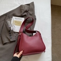 Chic burgundy wide strap shoulder bag in soft matte leather for stylish daily commute - Red
