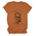 Détail de l'imprimé Suriel Tea Co sur un t-shirt col rond de couleur orange brûlé - S / Orange Brûlé (Impression Noire)