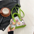 Green shell-shaped crossbody bag with 3D panda and floral embroidery on a white fabric - Panda Style / Large