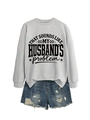 Flat lay of light grey sweatshirt with slogan and distressed denim shorts for casual style - Grey (Black Font)