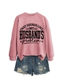 Flat lay of pink crewneck sweatshirt with black slogan print and distressed denim shorts - Rose Gold (Black Font)