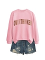 Detailed view of pink crewneck sweatshirt featuring Overthinker text and ribbed cuffs - Pink