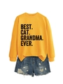 Detail of Best Cat Grandma Ever yellow sweatshirt paired with distressed denim shorts - Yellow (Black Print)