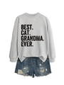 Flat lay of gray sweatshirt with Best Cat Grandma Ever print and ripped denim shorts - Grey (Black Print)