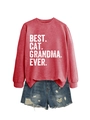 Detail of red sweatshirt with BEST CAT GRANDMA EVER print and ripped denim shorts - Red (White Print)
