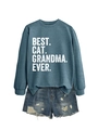 Detail of Best Cat Grandma Ever sweatshirt paired with distressed denim shorts - Blue (White Print)