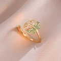Macro detail of golden monstera leaf ring with pavé green and white zircon crystals - Gold Monstera Leaf Open Ring