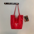 Large red nylon tote bag with white lettering and red striped lining detail - Red B-Side (Letter Print)