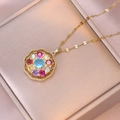 Collana vintage dorata con ciondolo floreale in zirconi blu e gemme multicolore - Collana Floreale Multicolore (X0032)