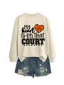 Detail of a beige oversized sweatshirt with heart basketball print and ripped denim shorts - S / Tops / Sand