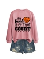 Detail of pink sweatshirt with My heart is on that court print and ripped denim shorts - S / Tops / Rose Gold