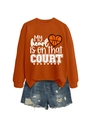 Detail of orange sweatshirt with My heart is on that court print and distressed denim shorts - S / Tops / Orange