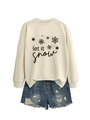 Detail of Let It Snow sweatshirt featuring snowflakes and high-quality cotton texture - Sand (Black Print)