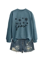 Detail of Let It Snow sweatshirt paired with distressed blue denim shorts for winter - Blue (Black Print)
