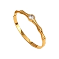 Elegante bracciale rigido dorato stile bambù con zircone centrale brillante incastonato - Oro