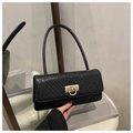 Detail of black woven texture leather bag with elegant golden twist lock and long handle - Black