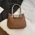 Sac fourre-tout en cuir grainé marron et beige avec logo doré et poignées contrastées - Marron