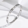 Bracciale rigido in acciaio inossidabile argento lucido con numeri romani su seta - Colore Acciaio Numeri Romani Stile Svuotato (TT0023)