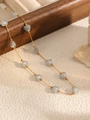 Delicate heart-shaped crystal beaded necklace in light blue-grey on a gold chain - Gold Tone + Grey