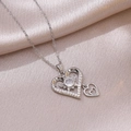 Minimalist double heart zircon pendant necklace on elegant champagne silk satin background - Steel Color Style (X3173)