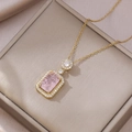 Golden necklace featuring a pink rectangular gemstone pendant with micro-pave crystals - Pink(X3131)