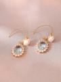 Detail of drop earrings featuring light blue oval zircon and teardrop pearl on pink satin - Light Blue Gemstone Pearl Earrings (E1229)