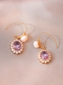 Detail of wire-wrapped gold earrings with pink pearl and purple oval gemstone - Pink Purple Gemstone Pearl Earrings (E0667)