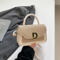 Piccola borsa a mano in pelle color crema e twill con fibbia metallica a forma di D - Bianco Sporco