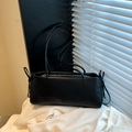 Minimalist black leather shoulder bag with side drawstring and long handle straps - Black