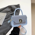 Light blue faux leather handbag with denim flap and golden metal D-buckle detail - Blue