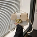 Borsa a mano chic con trama intrecciata, fibbia dorata e design bicolore, vista a mano - Bianco