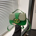 Minimalist green saddle bag with tweed flap and gold metal buckle detail on shoulder strap - Green