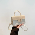 Chic beige underarm bag with woven flap detail and floral clasp for women - Off White